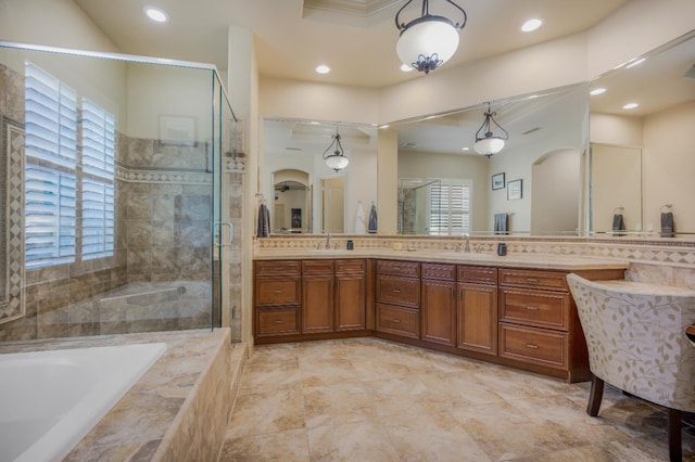 2136 E Royal Dornoch Ave, Fresno, CA 93730 - full bathroom with a stall shower, double vanity, a garden tub, and recessed lighting