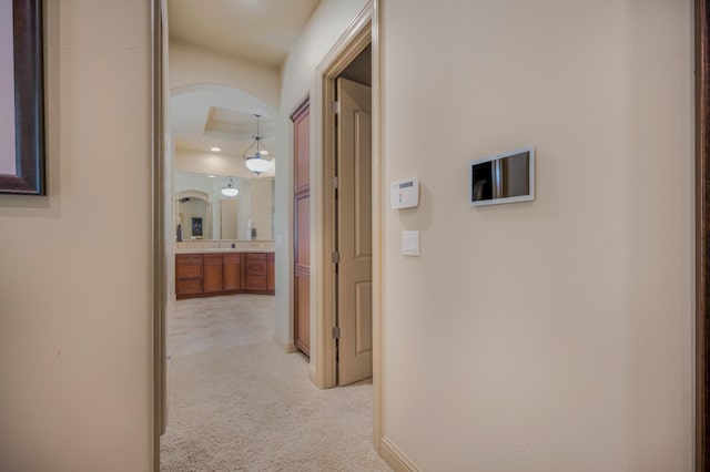 2136 E Royal Dornoch Ave, Fresno, CA 93730 - hallway with light colored carpet