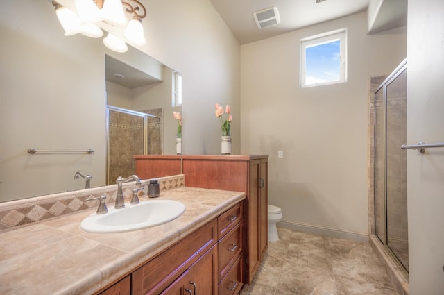 2136 E Royal Dornoch Ave, Fresno, CA 93730 - bathroom with toilet, vanity, a stall shower, and a chandelier
