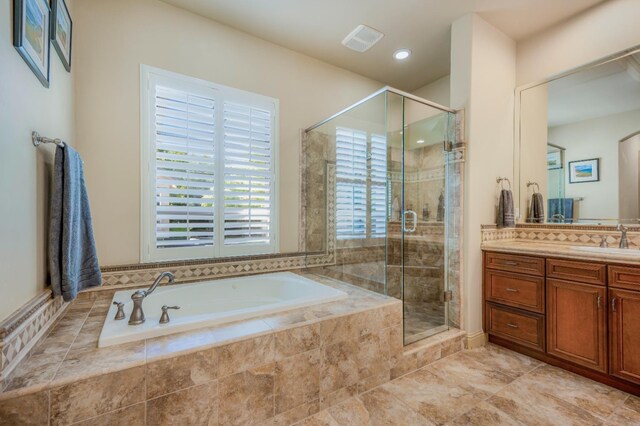 2136 E Royal Dornoch Ave, Fresno, CA 93730 - full bath with a bath, vanity, and a shower stall