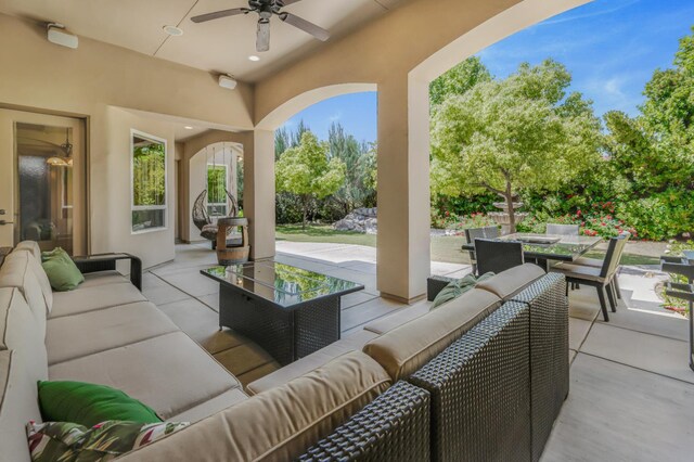 2136 E Royal Dornoch Ave, Fresno, CA 93730 - view of patio / terrace with an outdoor living space, outdoor dining space, and a ceiling fan