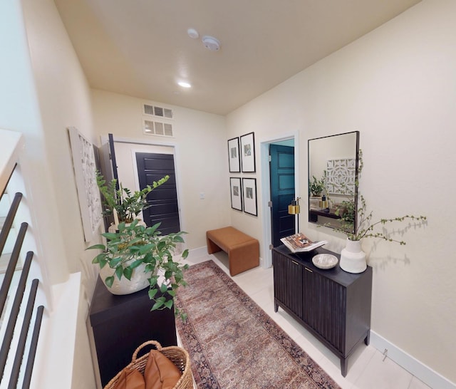 2897 E Tamarind Dr, Fresno, CA 93730 - foyer featuring baseboards and light tile patterned floors