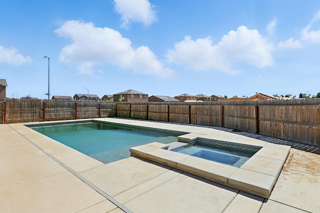 1985 Alma Ct, Chowchilla, CA 93610 - view of swimming pool with a fenced backyard, a patio, a residential view, and a pool with connected hot tub