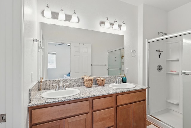 1985 Alma Ct, Chowchilla, CA 93610 - full bathroom with a stall shower and double vanity