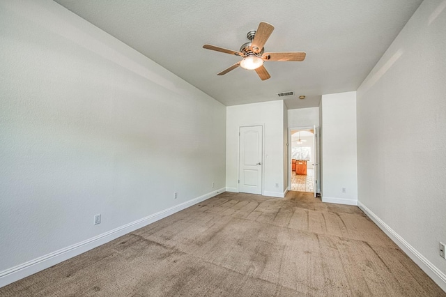 1251 E Rosemont Ln, Fresno, CA 93730 - unfurnished bedroom featuring carpet flooring, baseboards, lofted ceiling, a ceiling fan, and ensuite bath