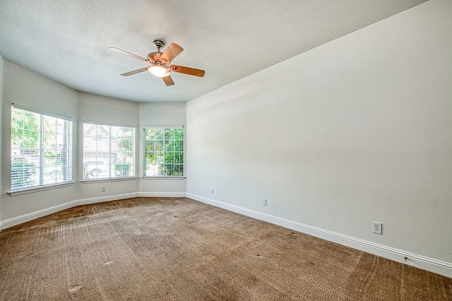 1251 E Rosemont Ln, Fresno, CA 93730 - carpeted spare room with ceiling fan, plenty of natural light, and baseboards