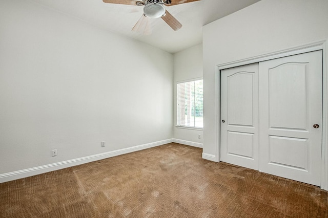 1251 E Rosemont Ln, Fresno, CA 93730 - unfurnished bedroom featuring carpet floors, baseboards, a closet, and ceiling fan