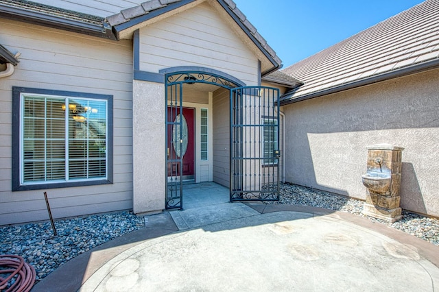 1251 E Rosemont Ln, Fresno, CA 93730 - doorway to property featuring a gate