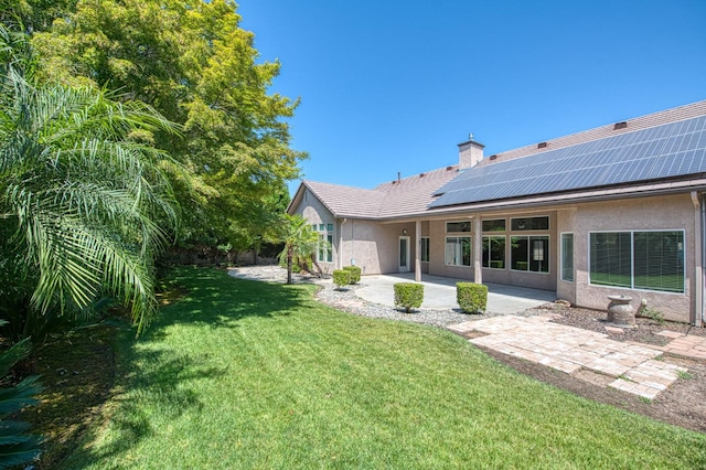 1251 E Rosemont Ln, Fresno, CA 93730 - view of green lawn with a patio