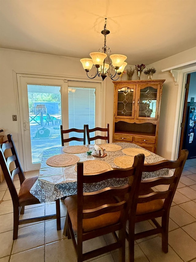 31117 Longview Ln E, Coarsegold, CA 93614 - dining space featuring a chandelier and light tile patterned floors