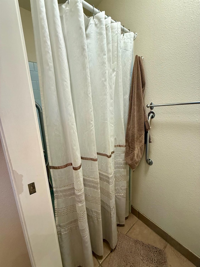 31117 Longview Ln E, Coarsegold, CA 93614 - bathroom featuring tile patterned floors and a shower with shower curtain