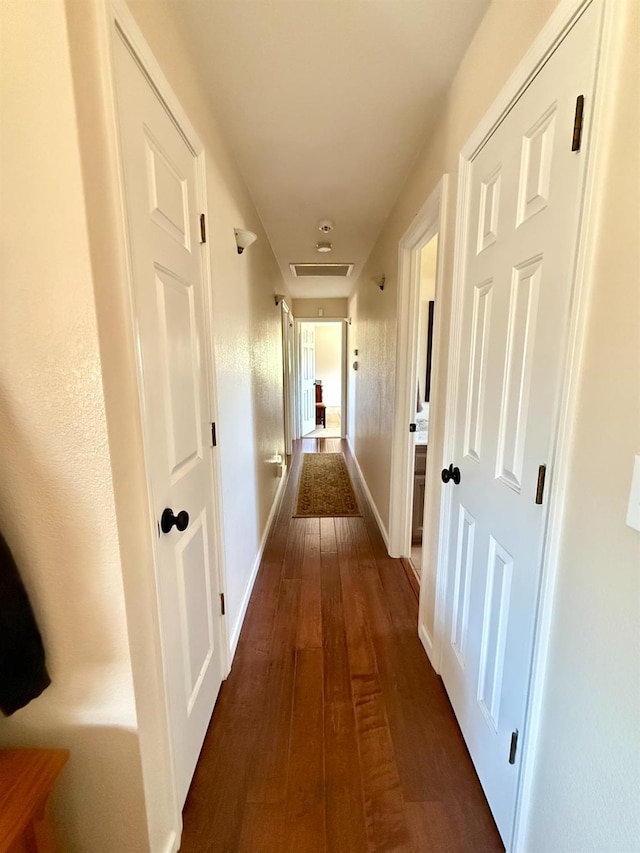 31117 Longview Ln E, Coarsegold, CA 93614 - hall featuring dark wood finished floors and baseboards