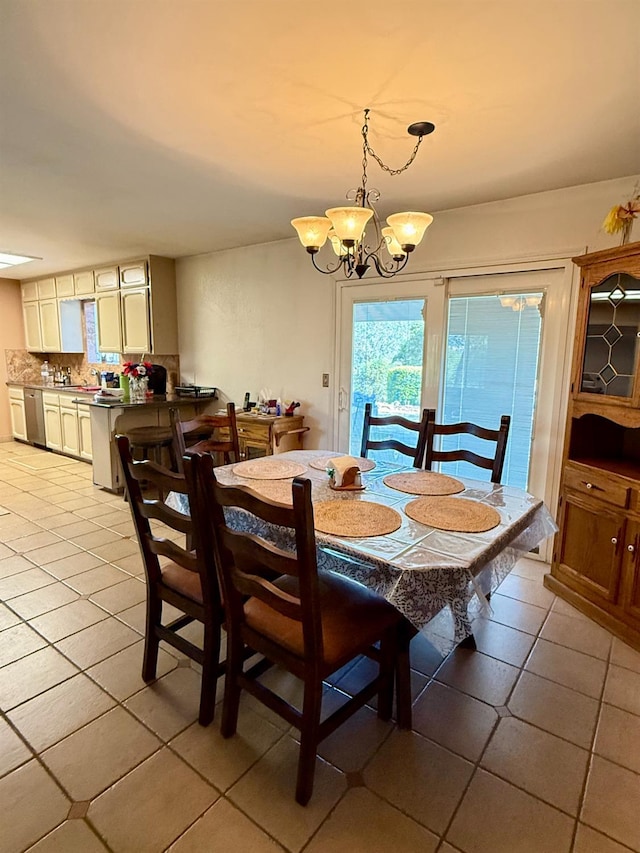 31117 Longview Ln E, Coarsegold, CA 93614 - dining space featuring light tile patterned floors and a chandelier