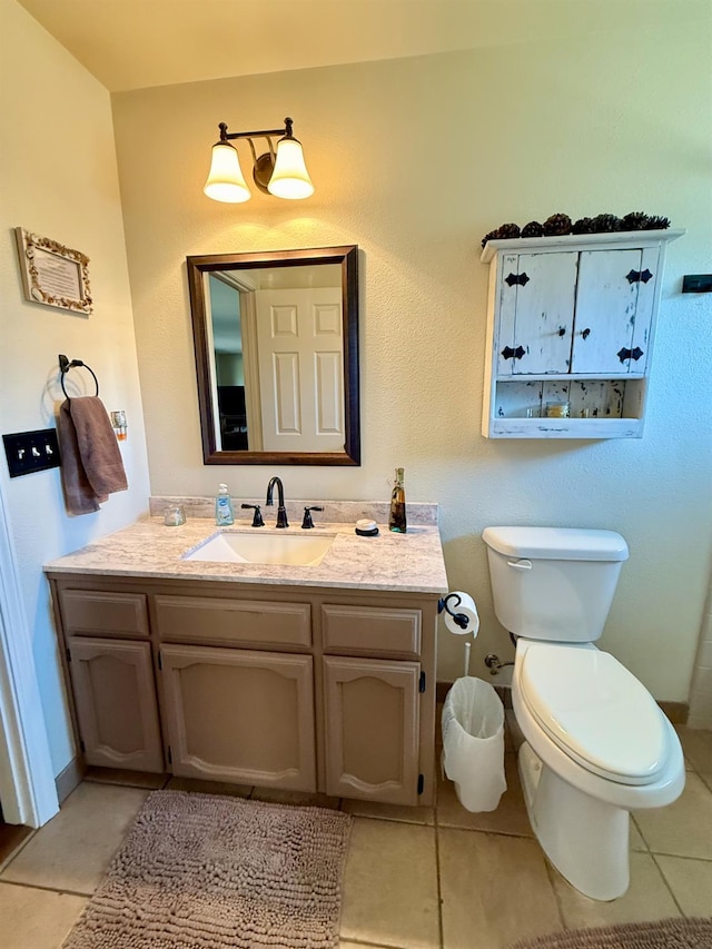 31117 Longview Ln E, Coarsegold, CA 93614 - half bathroom featuring tile patterned floors, vanity, and toilet