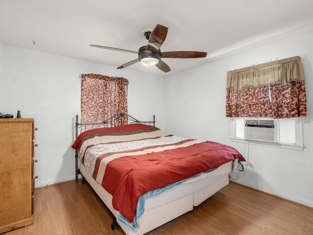 1632 W Shields Ave, Fresno, CA 93705 - bedroom featuring wood finished floors, baseboards, and a ceiling fan
