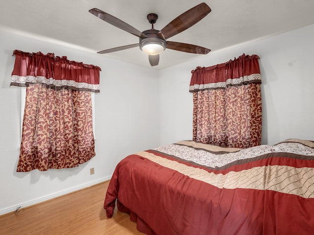 1632 W Shields Ave, Fresno, CA 93705 - bedroom featuring light wood-style flooring, baseboards, and a ceiling fan