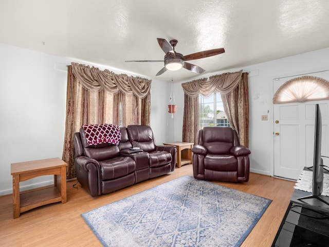 1632 W Shields Ave, Fresno, CA 93705 - living area with ceiling fan and light wood finished floors