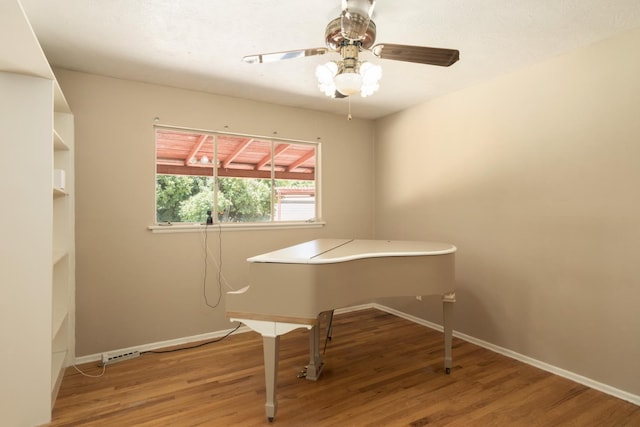 1438 E Rialto Ave, Fresno, CA 93704 - unfurnished office with wood finished floors, a ceiling fan, and baseboards