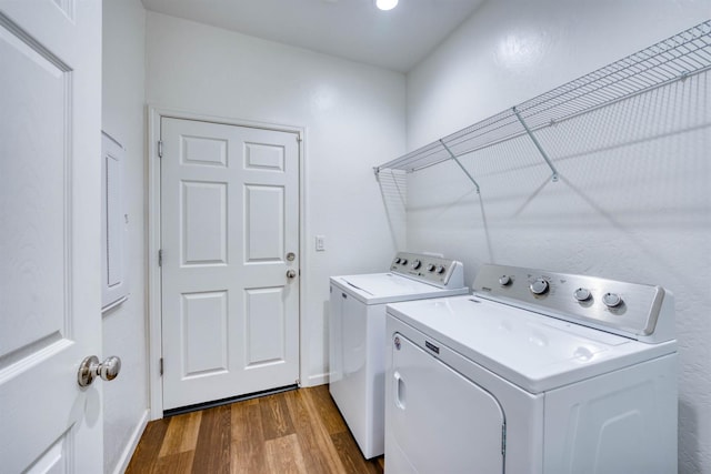 6659 E Vassar Ave, Fresno, CA 93727 - laundry room featuring washing machine and clothes dryer and dark wood-style floors