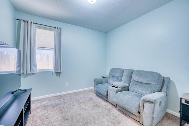 6659 E Vassar Ave, Fresno, CA 93727 - living area with carpet floors and baseboards