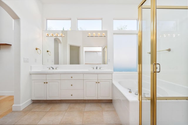 2189 W Via Delfini, Fresno, CA 93711 - bathroom featuring a garden tub, double vanity, a shower stall, and tile patterned floors