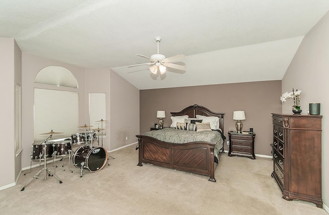 311 S Fowler Ave, Fowler, CA 93625 - bedroom with baseboards, lofted ceiling, light carpet, and a ceiling fan