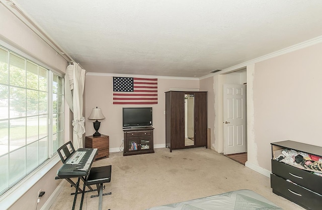 311 S Fowler Ave, Fowler, CA 93625 - living area with crown molding, baseboards, carpet floors, and a textured ceiling