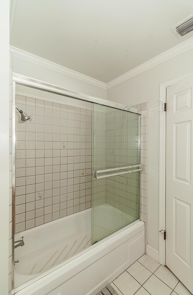 311 S Fowler Ave, Fowler, CA 93625 - full bathroom featuring tile patterned floors, bath / shower combo with glass door, and ornamental molding