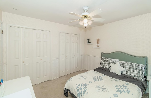 311 S Fowler Ave, Fowler, CA 93625 - carpeted bedroom featuring two closets and ceiling fan