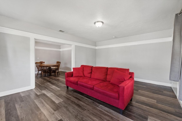 4112 E Platt Ave, Fresno, CA 93702 - living area featuring wood finished floors and baseboards