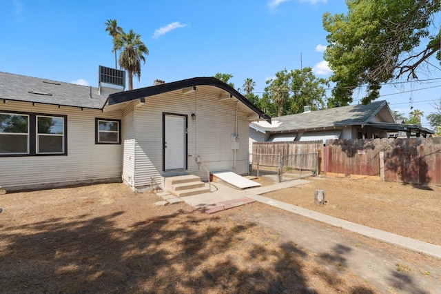 4112 E Platt Ave, Fresno, CA 93702 - rear view of property featuring entry steps