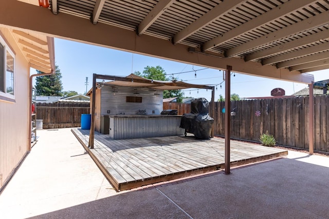 101 S Princeton Ave, Coalinga, CA 93210 - fenced backyard featuring a patio and a deck