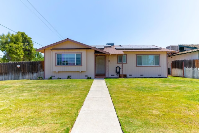 101 S Princeton Ave, Coalinga, CA 93210 - view of front of home with solar panels, crawl space, and cooling unit