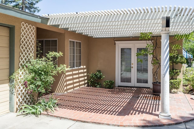 450 W Alluvial Ave, Clovis, CA 93611 - doorway to property with french doors, a pergola, stucco siding, and a patio area