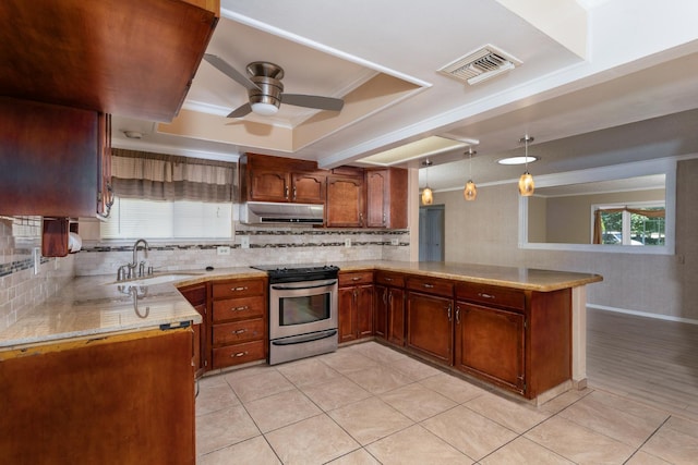 450 W Alluvial Ave, Clovis, CA 93611 - kitchen with stainless steel stove, ventilation hood, a sink, a ceiling fan, and decorative backsplash