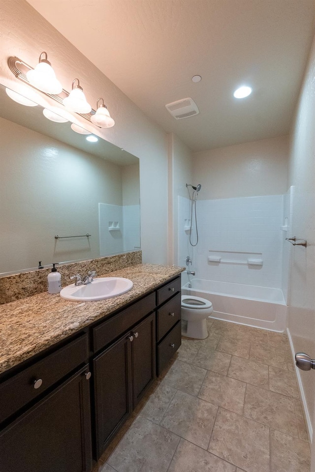 3083 N Stanley Ave, Fresno, CA 93737 - bathroom with vanity, toilet, and shower / bathtub combination