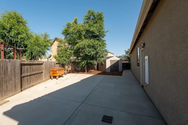 3083 N Stanley Ave, Fresno, CA 93737 - fenced backyard featuring a patio