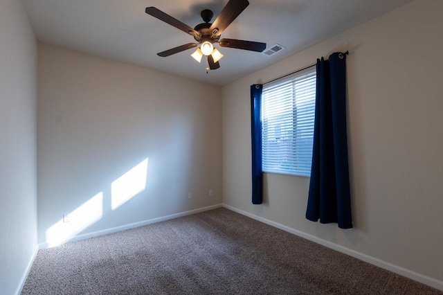 3083 N Stanley Ave, Fresno, CA 93737 - carpeted spare room with ceiling fan and baseboards