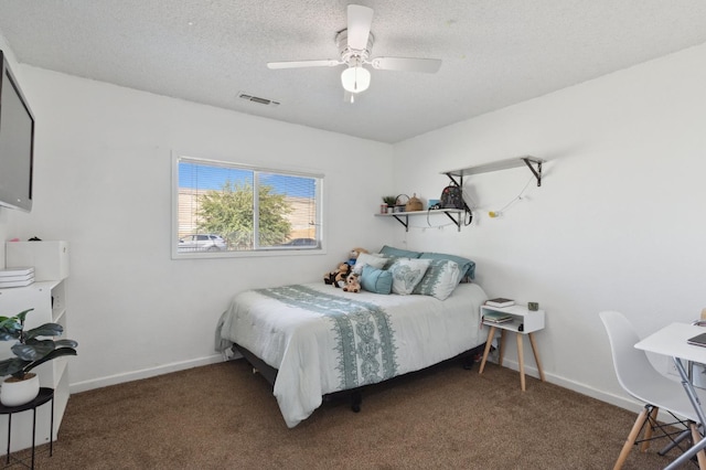 2316 S Kirk St, Fresno, CA 93706 - bedroom with carpet flooring, a textured ceiling, baseboards, and ceiling fan