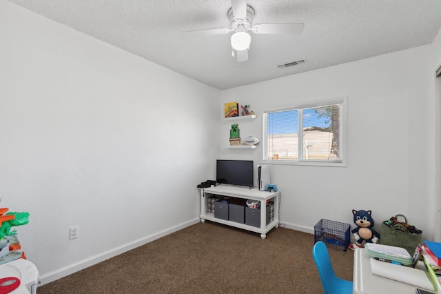 2316 S Kirk St, Fresno, CA 93706 - recreation room with carpet floors, a ceiling fan, a textured ceiling, and baseboards