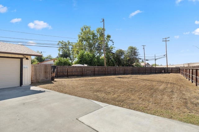 2316 S Kirk St, Fresno, CA 93706 - fenced backyard featuring driveway