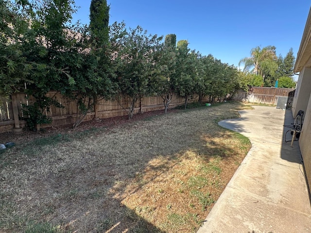 5804 W Chennault Ave, Fresno, CA 93722 - fenced backyard featuring a patio area