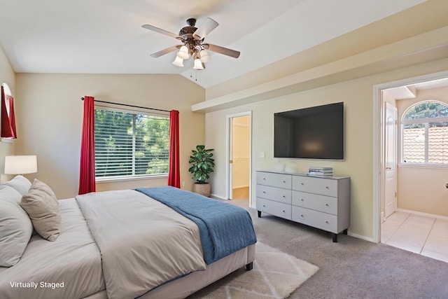 6481 N Alison Ln, Fresno, CA 93711 - bedroom with lofted ceiling, carpet floors, baseboards, ensuite bathroom, and a ceiling fan