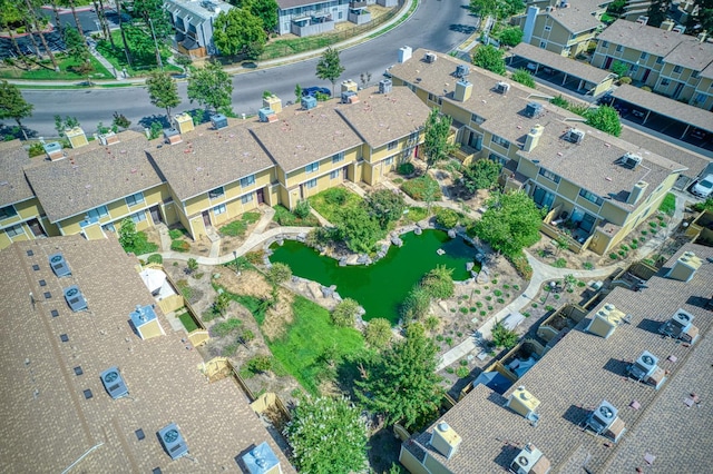 4885 N Backer Ave Unit 151, Fresno, CA 93726 - aerial view of property and surrounding area with a nearby body of water and nearby suburban area
