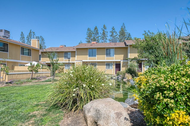4885 N Backer Ave Unit 151, Fresno, CA 93726 - view of property featuring central AC unit