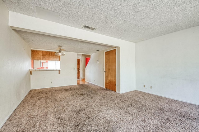 4885 N Backer Ave Unit 151, Fresno, CA 93726 - carpeted spare room featuring a textured ceiling and baseboards