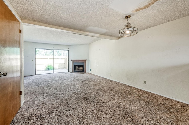 4885 N Backer Ave Unit 151, Fresno, CA 93726 - unfurnished living room with carpet floors, a textured ceiling, and a fireplace with flush hearth