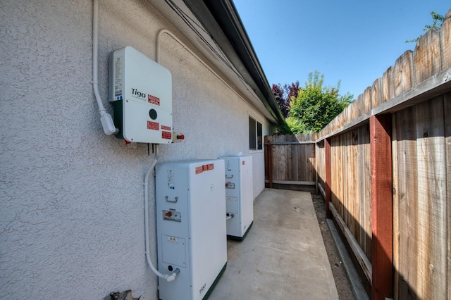 3171 W Sample Ave, Fresno, CA 93711 - exterior view of stucco siding, related energy utilities, and a power storage unit