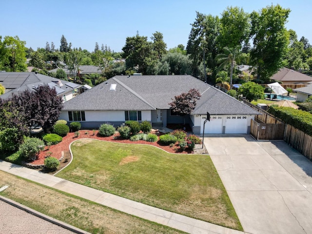 3171 W Sample Ave, Fresno, CA 93711 - single story home with an attached garage, driveway, roof with shingles, and a residential view