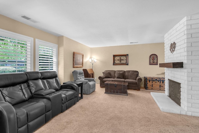 5072 N Forkner Ave, Fresno, CA 93711 - carpeted living area featuring a brick fireplace